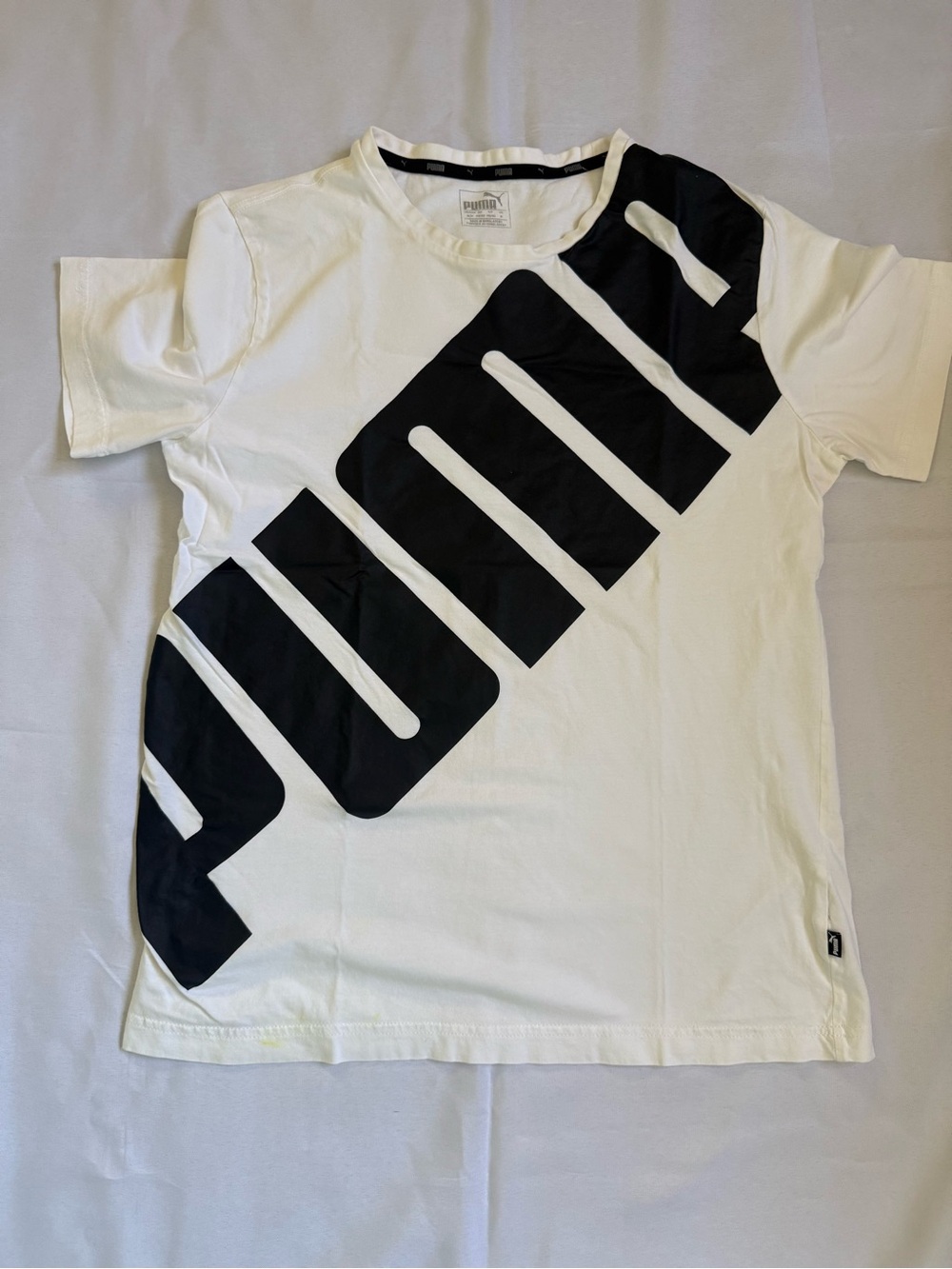 Puma White Short-Sleeve Tee with Large Black Diagonal Logo